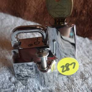 lot 287 image: H-D HELMET LOCK WITH KEY AS SHOWN