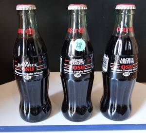 lot 28 image: OHIO STATE BUCKEYES HEISMAN TROPHY WINNERS - COCA COLA - VIC JANOWICZ (1950), HOWARD HOPALONG CASSADY (1955) & ARCHIE GRIFFIN (1974)