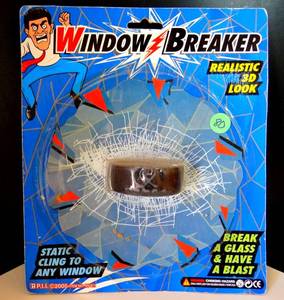lot 80 image: WINDOW BREAKER - 3D HOCKEY PUCK SMASHED WINDOW GAG - NIP