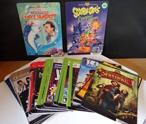 lot 122 image: RARE FIND - BLOCKBUSTER DVD DISPLAYS ( ASSORTED COLLECTION OF 50 TITLES)