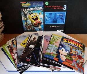 lot 125 image: RARE FIND - BLOCKBUSTER DVD DISPLAYS ( ASSORTED COLLECTION OF 50 TITLES)