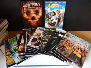lot 129 image: RARE FIND - BLOCKBUSTER DVD DISPLAYS ( ASSORTED COLLECTION OF 50 TITLES)
