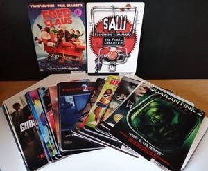 lot 131 image: RARE FIND - BLOCKBUSTER DVD DISPLAYS ( ASSORTED COLLECTION OF 50 TITLES)