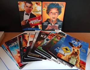 lot 132 image: RARE FIND - BLOCKBUSTER DVD DISPLAYS ( ASSORTED COLLECTION OF 50 TITLES)