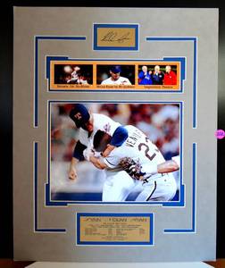 lot 202 image: NOLAN RYAN LEGENDARY MOMENTS MATTED PHOTO DISPLAY WITH METAL FACSIMILE SIGNATURE & BIO PLATE - MEASURES 16 X 20