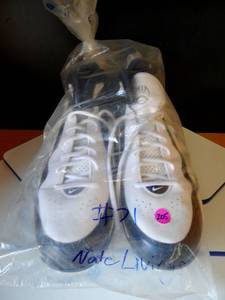 lot 205 image: DALLAS COWBOYS - NATE LIVINGS AUTHENTIC PLAYER WORN CLEATS - SIZE 16