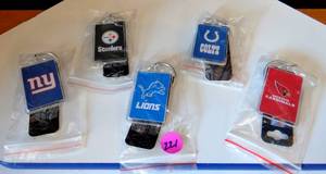 lot 221 image: ASSORTMENT OF OFFICIAL NFL LICENSED KEY CHAINS - GIANTS, STEELERS, LIONS, COLTS, & CARDINALS