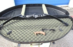 lot 48 image: Man Kung Fiberglass Compound Bow With Tru-Fire Pro Deluxe Bow Release Trigger And Bow Guard Caring Case.