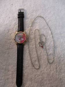 lot 126 image: NEW-Kansas City Chiefs, NFL Quartz Watch With Leather Band And Chiefs NFL Triangle Pendant with Chain Necklace