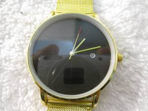 lot 142 image: New-Fashion quartz Gold Tone Band and Hands On Black Face-Watch with calendar function, stainless steel Gold Tone mesh belt band.