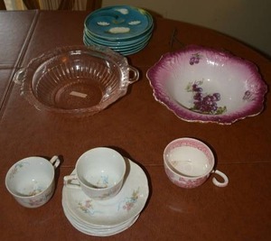 lot 13 image: Old Glassware O.P. CO. Syracuse Shina Saucers and 2 Tea Cups, Antique Grape Serving Bowl, Depression Glass and More