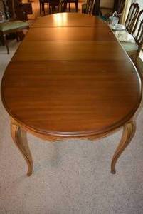 lot 16 image: Long Dining Table, Cabriole Legs, 3 Leaves Total, Padded Cover as well
