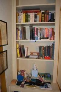 lot 113 image: Contents of Shelves Readers Digest, Drug Handbooks, Cross Pen in Box and More