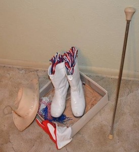 lot 122 image: Twirling Baton, Hat, Gloves and Boots