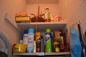 lot 131 image: Top Closet Shelves, Cleaning Supplies Pine Sol, Murphy Oil Soap, Glass Cleaner and More