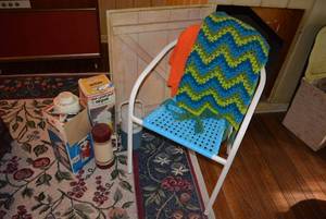 lot 143 image: Metal Chair with Plastic Woven Seat, Afghan, 2 Air pots, Coleman Cooler