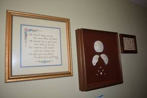 lot 141 image: Framed Wall Art Sand Dollar Shadow Box, Cross-Stitch Poem, Paper cutout Poem