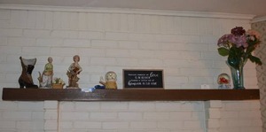 lot 138 image: Mantle Items Ceramic Figurines and Shoe, Owl Snow globe, Blue Vase with Flowers