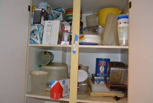 lot 161 image: Contents of Kitchen Cabinet Light BulbsFlood Lamps, Tupperware Storage Containers and Toaster