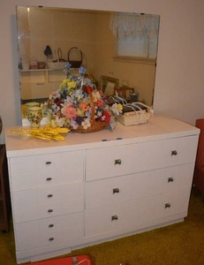 lot 203 image: Mid-Century Dresser and Contents Metal Knobs, Dovetail Drawers, Flower Basket and more