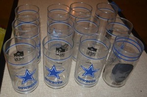 lot 205 image: Set of 12 Dallas Cowboys Glasses One with Efren Herrera Picture
