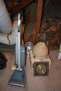lot 212 image: 2 Hoover Vacuums, Milk Can, Oster Wig Case and More