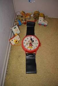 lot 224 image: Giant Mickey Mouse Watch Clock - 50 Happy Years, Vintage Fisher Price Toys Wooden Animals, Lacing Shoe, Radio and Camera