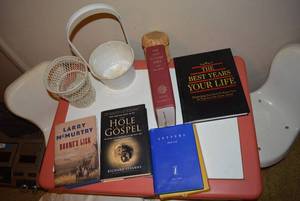 lot 234 image: Books and Baskets The Best Years of Your Life, Letters from God, The Hole in our Gospel, Boones Lick, and The New English Bible Plus a Sand Dollar