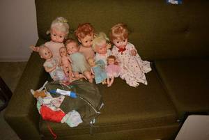 lot 247 image: Vintage Dolls and Outfits