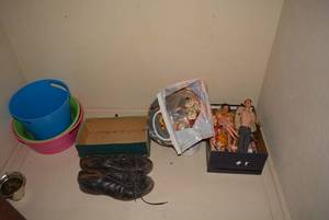 lot 260 image: Contents on Shelf Dolls and Doll Outfits, Pails and Pair of Cleats