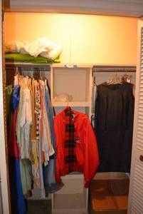 lot 270 image: Contents of Closet Clothes, Ties, Books, Blanket and Pillow