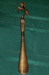 lot 126 image: Brass Unicorn Shoe Horn