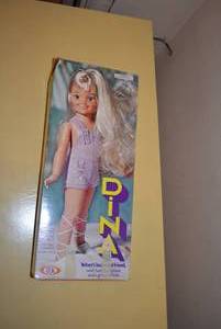 lot 242 image: Vintage Dina Doll by Ideal with Outfits
