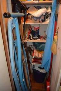 lot 130 image: Bottom Half of Closet Iron, Ironing Board, Hoover Vacuum, Brooms, Stadium Seats and More