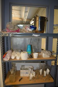 lot 76 image: Contents of Shelf 3 Crystal Cannisters, Champagne Glasses, Plastic Champagne Glasses and Ice Bucket