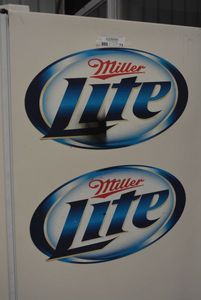 lot 72 image: 2 Miller Lite Magnets
