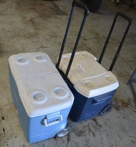 lot 92 image: Coleman Cooler with Wheels, Rubbermaid Cooler with Split Lid on Wheels