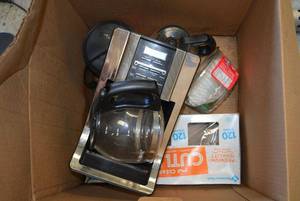 lot 94 image: Mr. Coffee Coffee Pot, Filters, extra pots, FreshAir Purifier by Ecoquest, and Bucket Heater