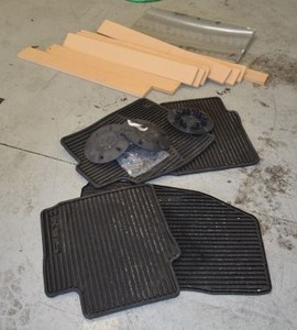lot 107 image: Mercedes Hub Caps, Car Floor Mats, Boards and Mirror