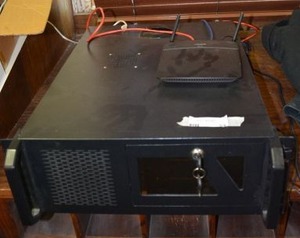 lot 54 image: Linksys Router and VideoSecurity Camera Hard drive and disc readerrecorder