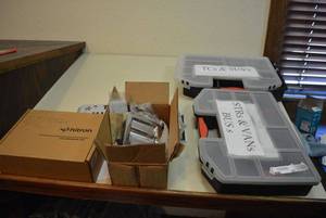 lot 57 image: 2 Plastic Storage Boxes, License Plates, AT&T Velocity Mobile Hotspot
