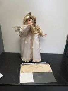 lot 41 image: Collectible Doll