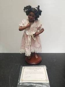 lot 42 image: Collectible Doll
