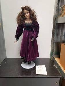 lot 59 image: Collectible Doll