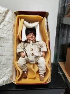 lot 86 image: Collectible Doll