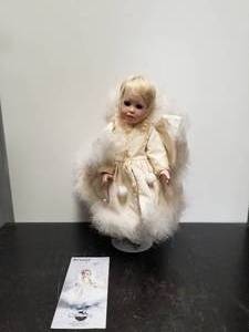 lot 103 image: Collectible Doll