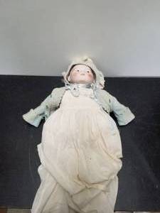 lot 104 image: Collectible Doll