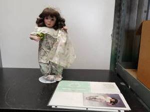 lot 134 image: Collectible Doll