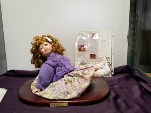 lot 140 image: Collectible Doll
