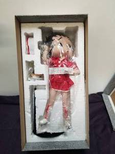 lot 199 image: Betty Boop Coca Cola porcelain doll